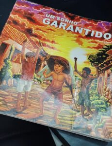 Leia mais sobre o artigo Contemplado pela Lei Paulo Gustavo, livro ‘Um sonho Garantido’ é lançado em Parintins